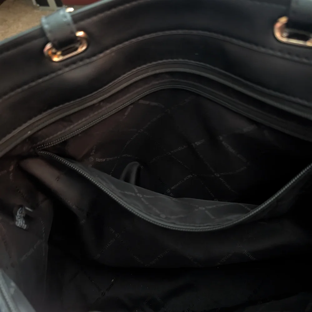 Michael Kors Black Tote with Gold Accents - Picture 7 of 16